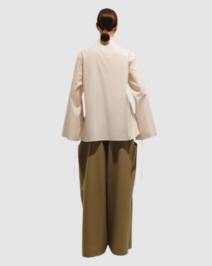 Loose fitting shirt with draws string