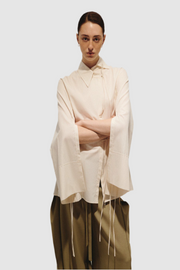 Loose fitting shirt with draws string