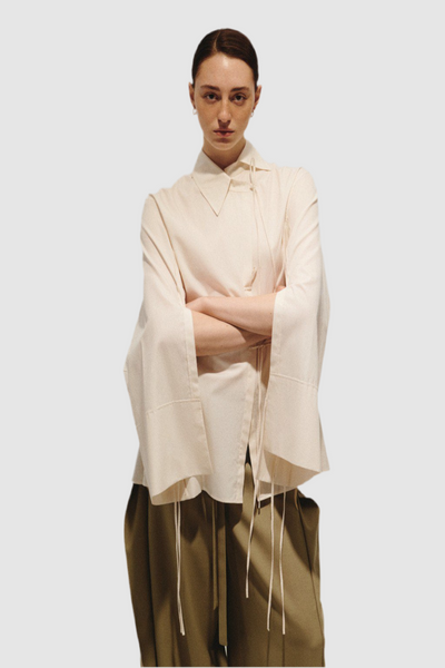 Loose fitting shirt with draws string